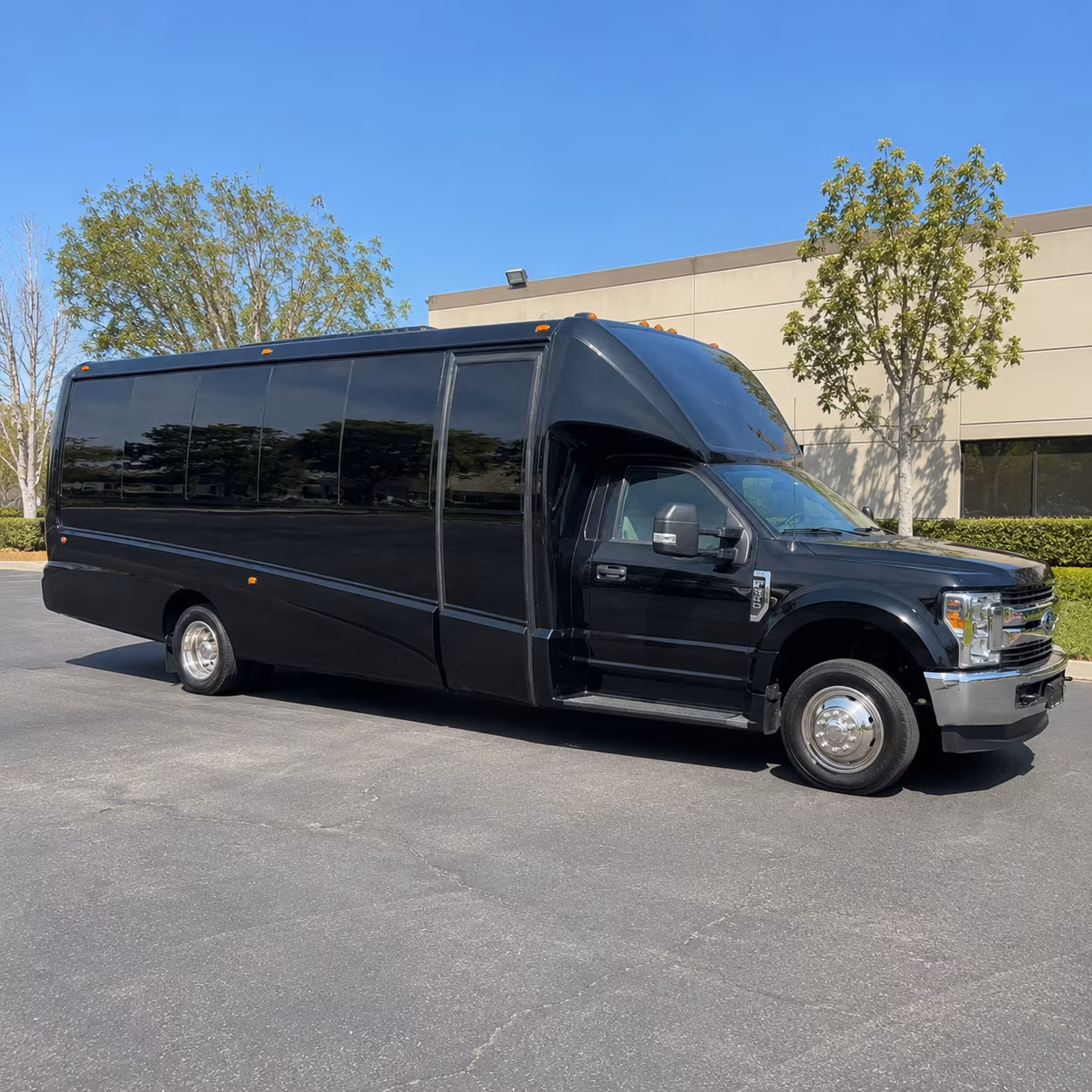 Wedding guests seated inside a party bus serving Hayward