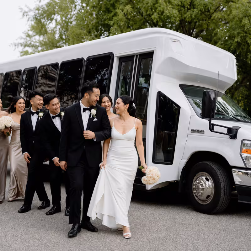 Passengers loading luggage while boarding an Hayward group shuttle