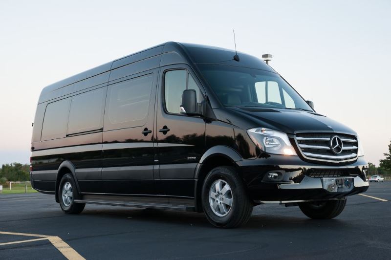 Orange 14 Passenger Sprinter Bus