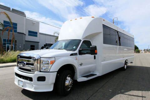 Orange 25 Passenger Limo bus